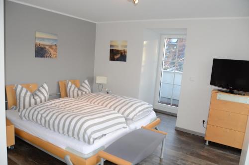 Postel nebo postele na pokoji v ubytování Residenz Glücksbringer