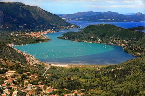 an aerial view of a lake in the mountains at Geni Bay in Yenion