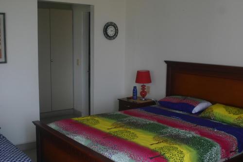 Cama o camas de una habitación en Apartment Manta, next to Hotel Oro Verde