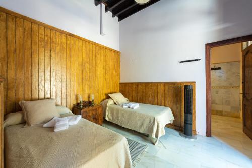 Ένα ή περισσότερα κρεβάτια σε δωμάτιο στο Villa la Atlantida