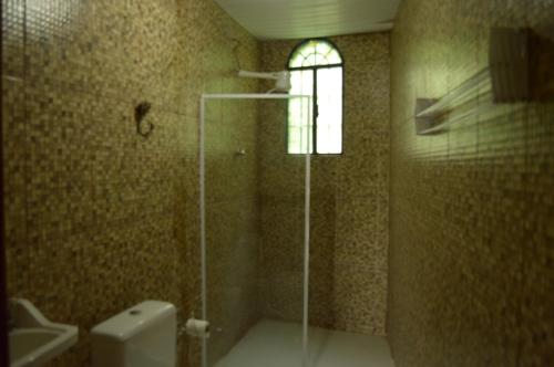 Ванная комната в Rio Natureza apart 116