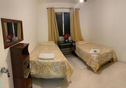 Ένα ή περισσότερα κρεβάτια σε δωμάτιο στο Posada Dilia del Alba