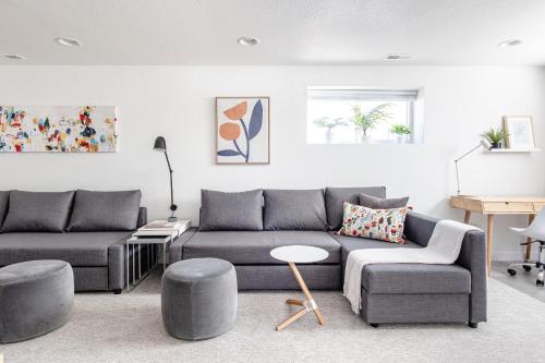 a living room with two couches and a table at Well-Stocked, Family Friendly Home on the Westside STR-1669 in Colorado Springs