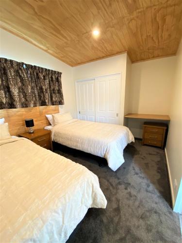 Una cama o camas en una habitación de Country Retreats on Ranzau 1