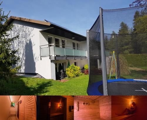 a house with a person sitting on a trampoline at Apartment Dolce Vita in Celje