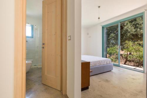 Легло или легла в стая в Villa Torre Guaceto con piscina by Wonderful Italy