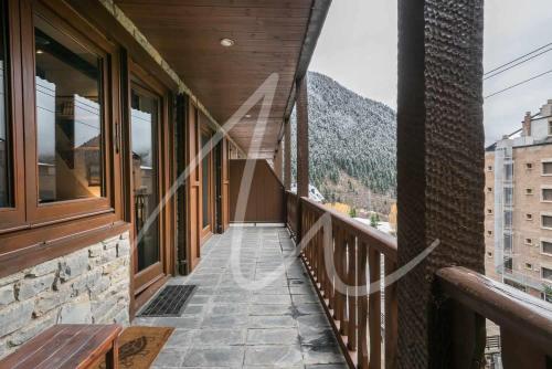a balcony with a view of a mountain at Amitges by SeaMount Rentals in Baqueira-Beret