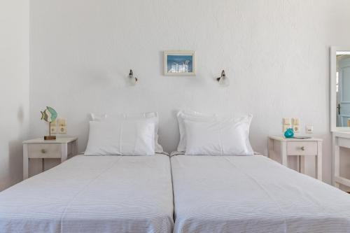 Giường trong phòng chung tại Stamatiou Estate