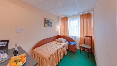 Кровать или кровати в номере Отель Новочеркасск