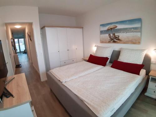 Postel nebo postele na pokoji v ubytování Riecht nach Meer