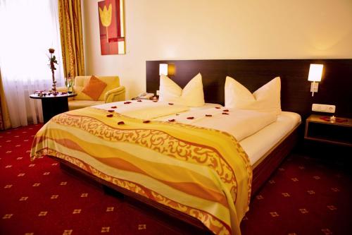 Letto o letti in una camera di Drexel´s Parkhotel