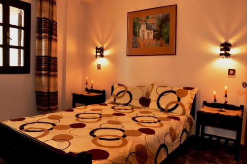 Postel nebo postele na pokoji v ubytování Heliotrope Apartments