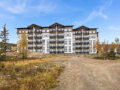 a large apartment building on top of a hill at Holiday Home Nordic chalet 9102 by Interhome in Ylläsjärvi
