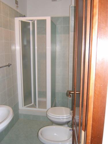 Koupelna v ubytování Hotel Delfino
