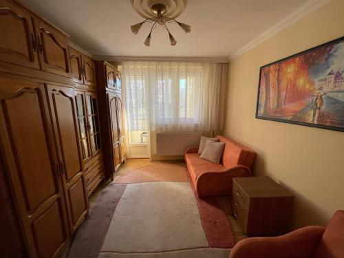 Predel za sedenje v nastanitvi Ulpiana Apartment