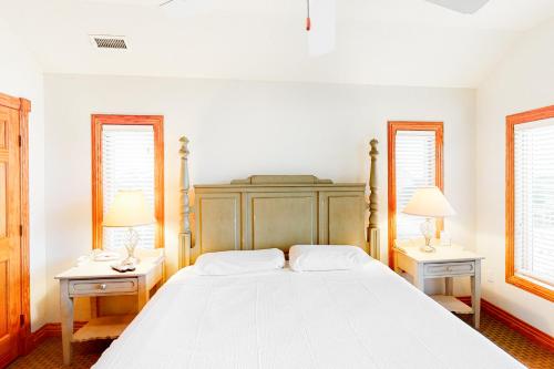 a bedroom with a large bed with two night stands at 7 Day Weekend #33-S in Salvo