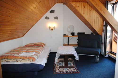 מיטה או מיטות בחדר ב-Chalet Lucie