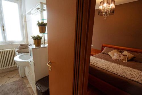 Ένα ή περισσότερα κρεβάτια σε δωμάτιο στο La Casa di Anna