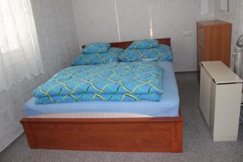 Posteľ alebo postele v izbe v ubytovaní Pine Wood Apartment 6