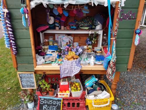 a vegetable stand in the side of a house at Cartmel in Aultbea