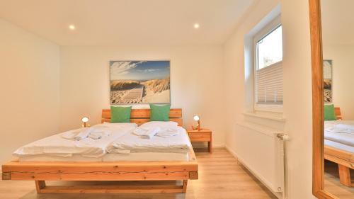 Postel nebo postele na pokoji v ubytování Mühlenhaus Siebkammer