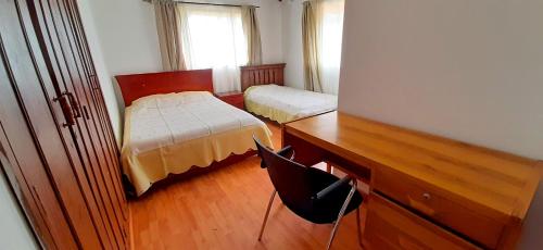 Postel nebo postele na pokoji v ubytování Hacienda Moncora, un lugar hermoso para toda la familia y los amigos