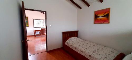Postel nebo postele na pokoji v ubytování Hacienda Moncora, un lugar hermoso para toda la familia y los amigos