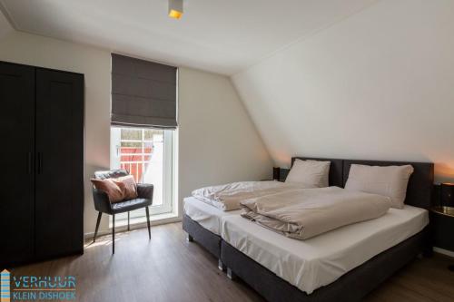 Postel nebo postele na pokoji v ubytování Appartement - Kaapduinseweg 13 Dishoek 13F Luxe 6 personen