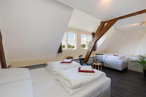 Postel nebo postele na pokoji v ubytování Holidayhome - Noordweg 56a Oostkapelle 56a