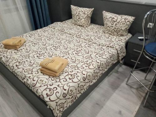 Ένα ή περισσότερα κρεβάτια σε δωμάτιο στο Апартаменты Ужгород