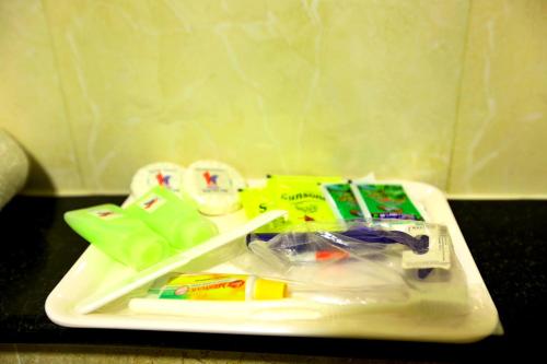 a tray filled with different items on a table at HOTEL KEK GRAND PARK in Chennai