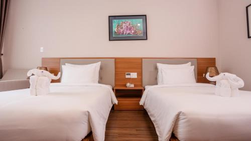 Cama o camas de una habitación en Elephants Hotel