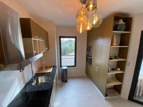 Kuchyň nebo kuchyňský kout v ubytování Porto-Vecchio, Luxe et lumière, Stanatura