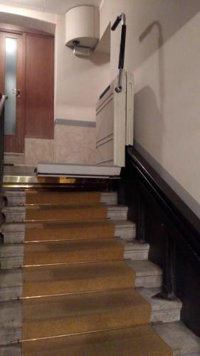 a stairway in a building with a stair case at Residence Al Granzo in Trieste