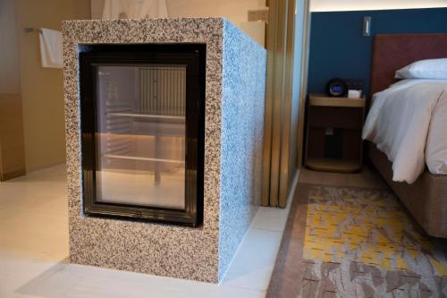 Postel nebo postele na pokoji v ubytování Hyatt Regency Ningbo Hangzhou Bay