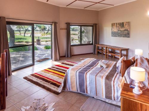 Voodi või voodid majutusasutuse Africa Awaits Lodge & Safaris toas