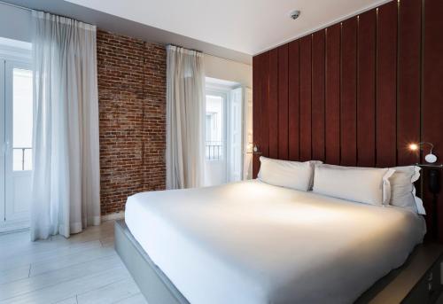 Postel nebo postele na pokoji v ubytování B&B HOTEL Madrid Centro Fuencarral 52