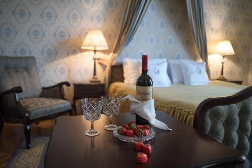 Postel nebo postele na pokoji v ubytování Grand Hotel