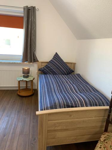 Postel nebo postele na pokoji v ubytování Ferienwohnung_25