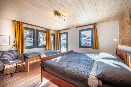 Postel nebo postele na pokoji v ubytování Room's chez BeNi