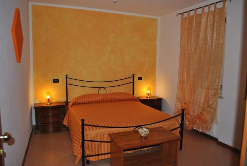 Postel nebo postele na pokoji v ubytování Albergo Quattro Pini