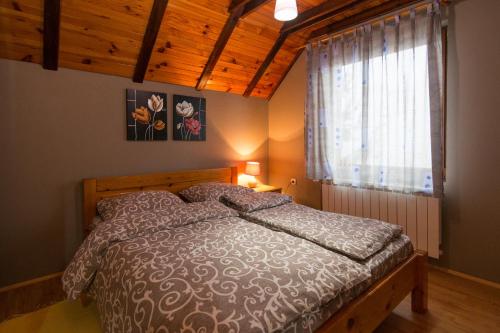 En eller flere senge i et værelse på Apartments Andrić