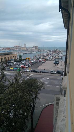 a view of a parking lot with cars in a parking lot at Residence Al Granzo in Trieste