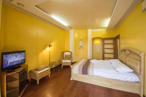 Ein Bett oder Betten in einem Zimmer der Unterkunft DayFlat Apartments Khreschatyk