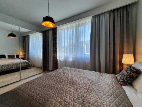 Ein Bett oder Betten in einem Zimmer der Unterkunft Apartament Otulina
