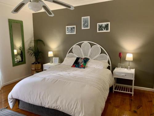 Ένα ή περισσότερα κρεβάτια σε δωμάτιο στο The Little Hideaway Guesthouse