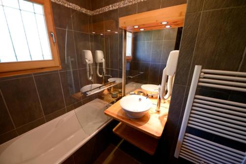 Ένα μπάνιο στο Appartements de la Chamoissière
