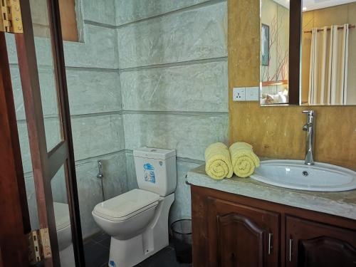 Vannituba majutusasutuses Serendib Village Guest House
