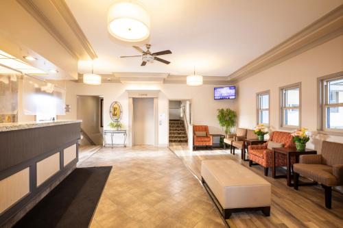 a lobby of a hospital with a waiting room at Tower Inn & Suites in Quesnel