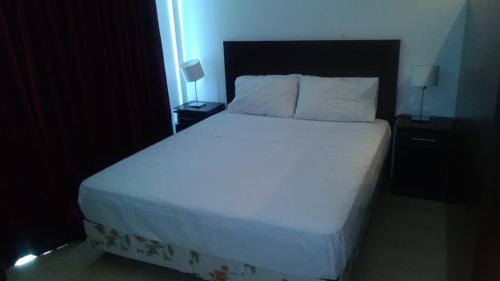 Krevet ili kreveti u jedinici u okviru objekta Nordelta Condominio Loft Bahia Grande Monoambiente de 40 m2